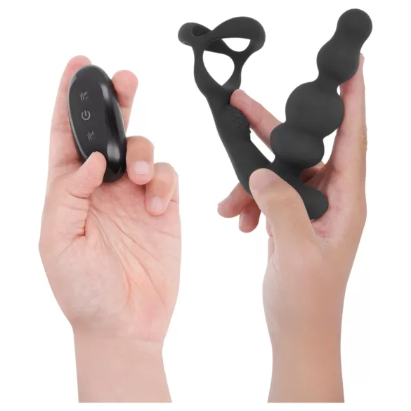 Addicted Toys - analvibrator med roterende hoved og penisring - sort